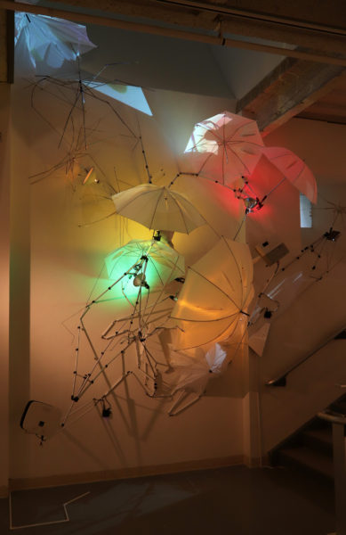 An Attempt to Communicate with the Sky Site specific Installation Umbrellas, tripods, lights, electrical cord, plastic, power strip, projectors, video dimensions variable 2019